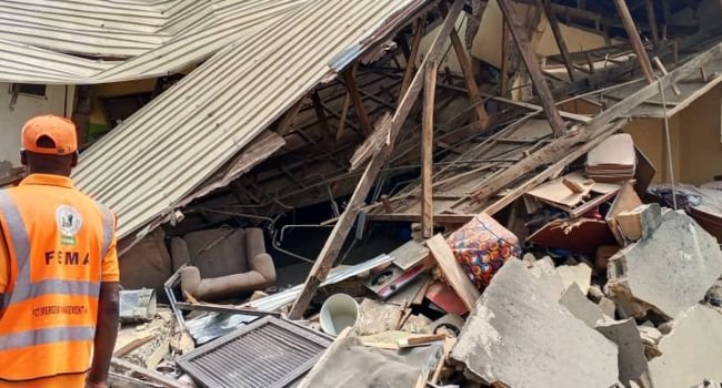 The photo of a collapsed one-storey building in Abuja.